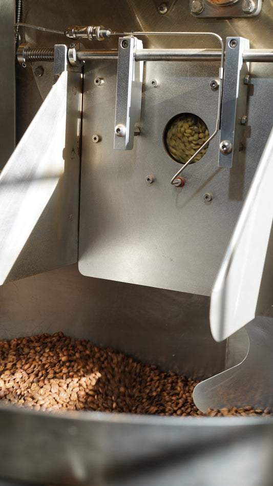 Coffee roasting machine with coffee beans inside